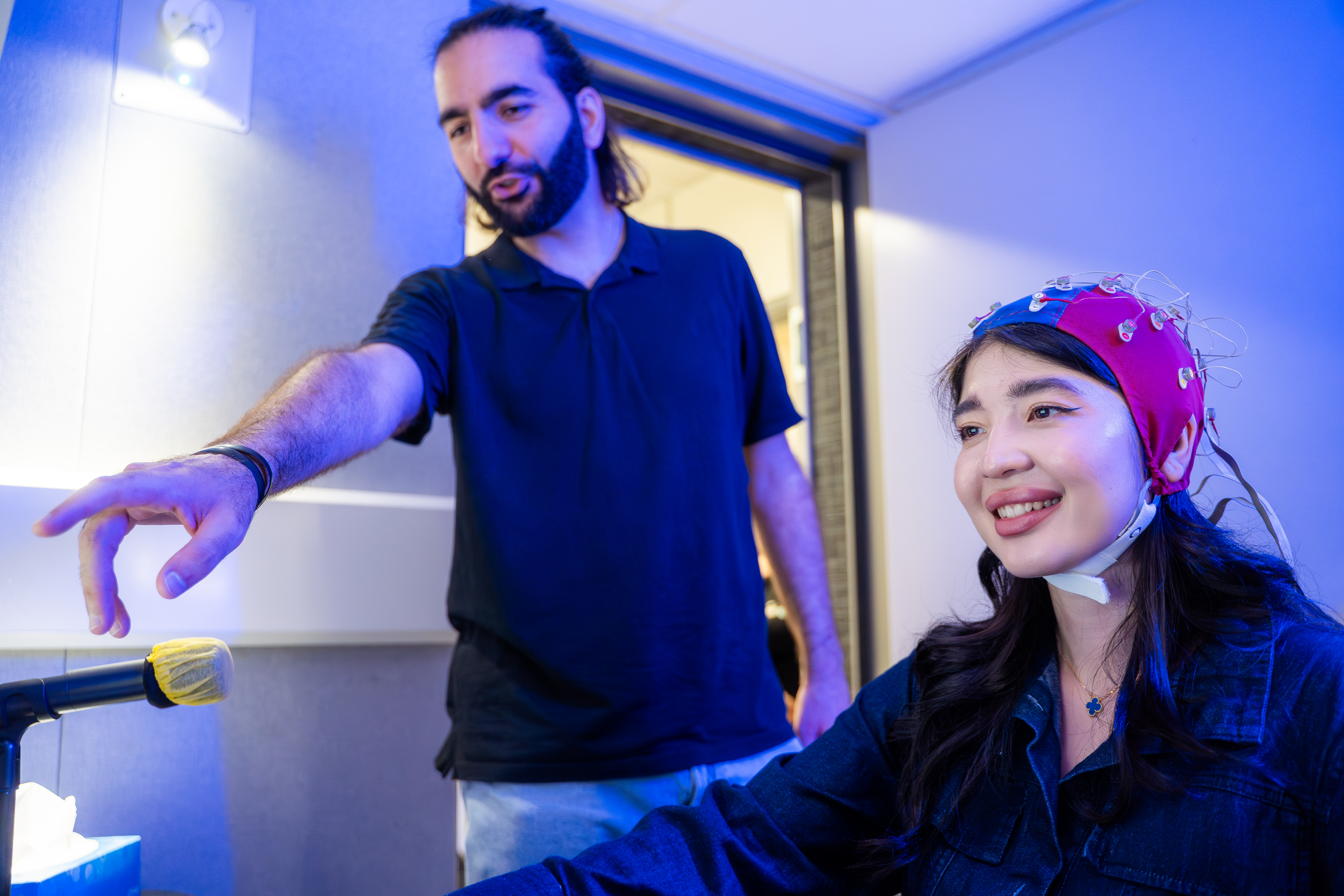 A student and technician using the linguistics lab
