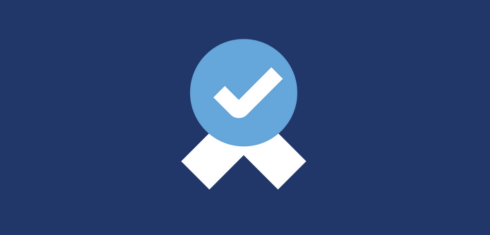 A graphic of a ribbon with a tick