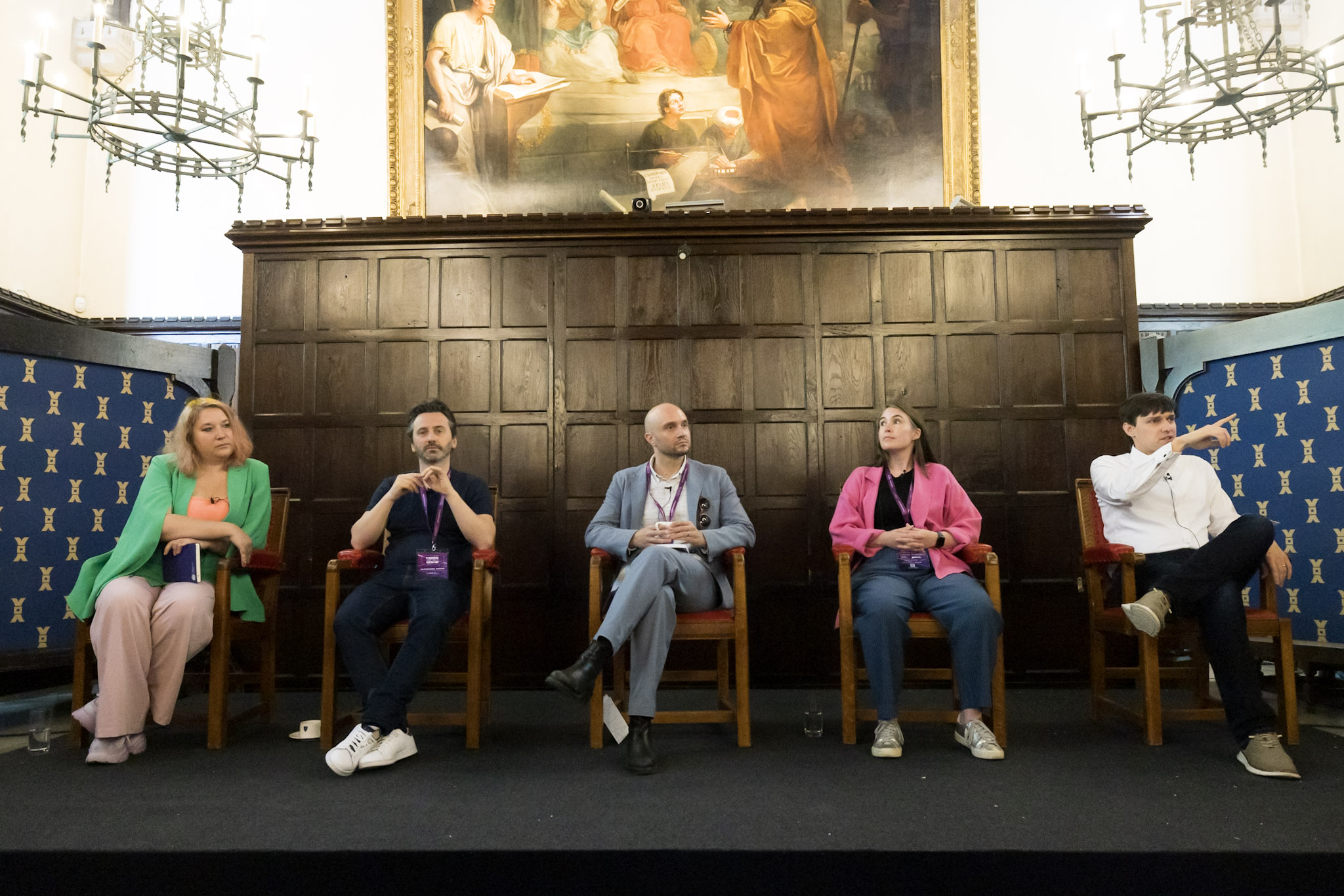 More Than Just a Game 2024 Panel of speakers sat on the stage in armchairs