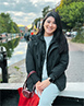 Sophia Villalta sitting on by the canal in Mile End.