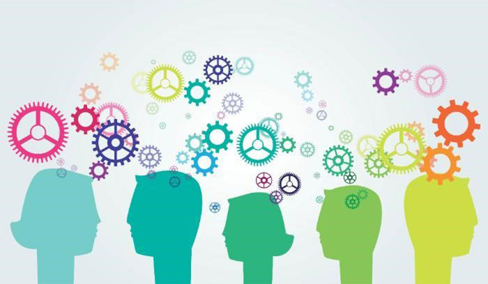 Graphic image of cog, wheel and heads