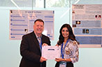 Lee Davies (Chief Executive of CIPA) handing the certificate for first prize to winner Zoya Yousef (University of Cambridge).