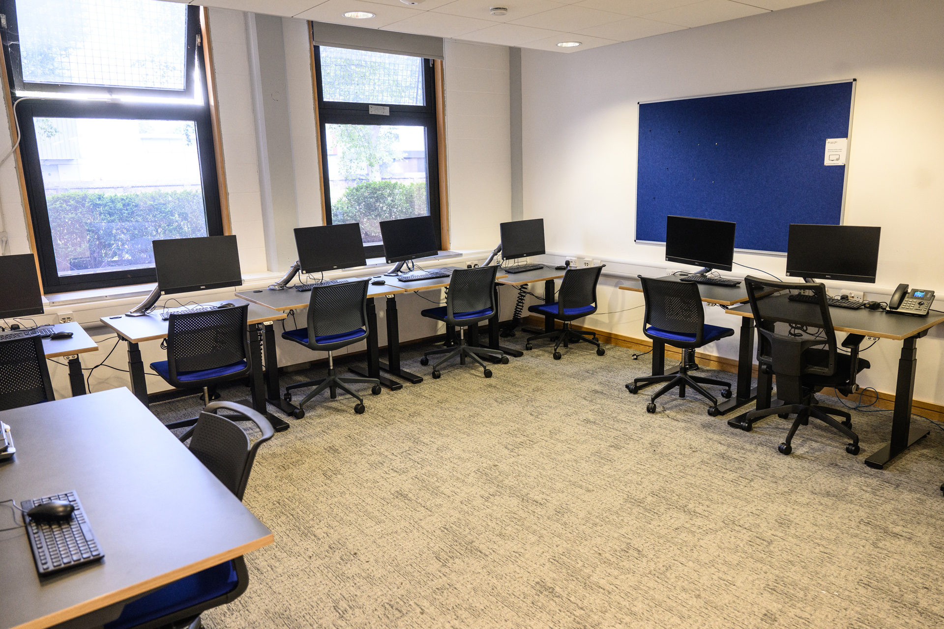 Height adjustable desks and PCs with assistive technology software
