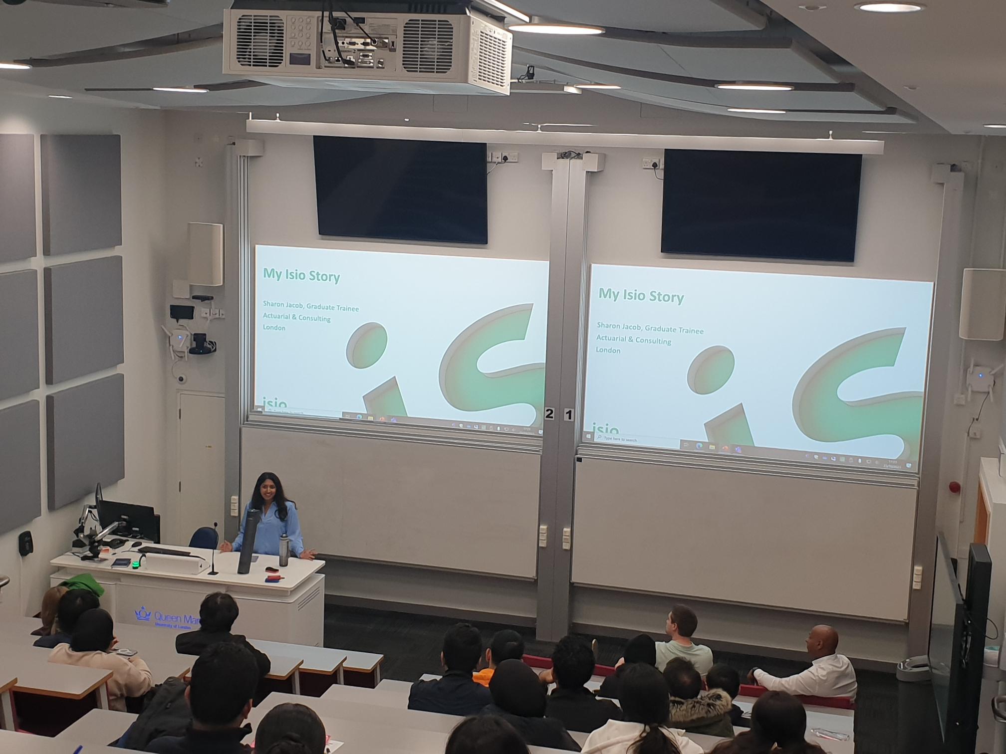A group of students gathered in a lecture theatre