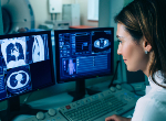 Radiologist reading a CT scan. Credit:peakSTOCK/iStock.com