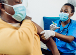 Man being vaccinated. iStock.com