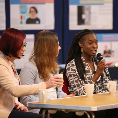 Diana Akhano speaking at an event