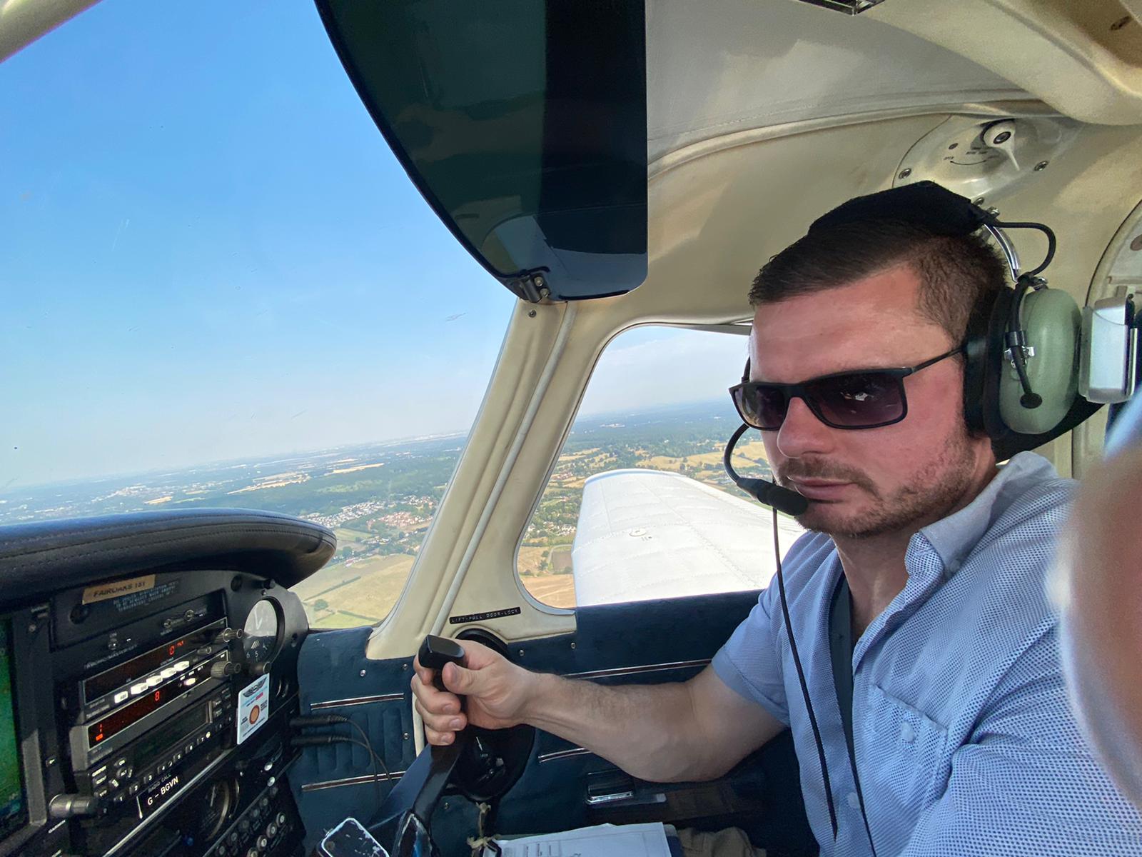 Matt flying a plane
