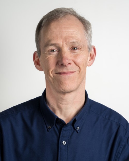 A photo of Tim Bale against a plain background