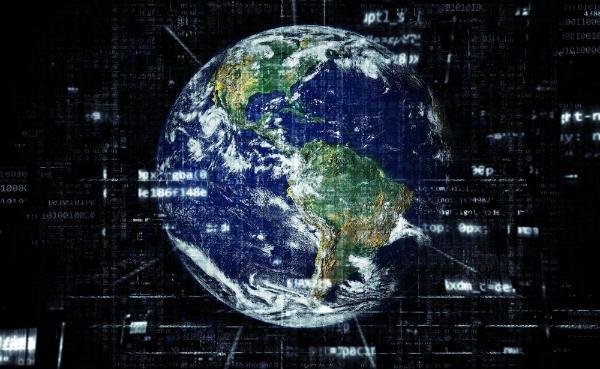An abstract image of the planel earth on a black background with lines of code superimposed on the top in places