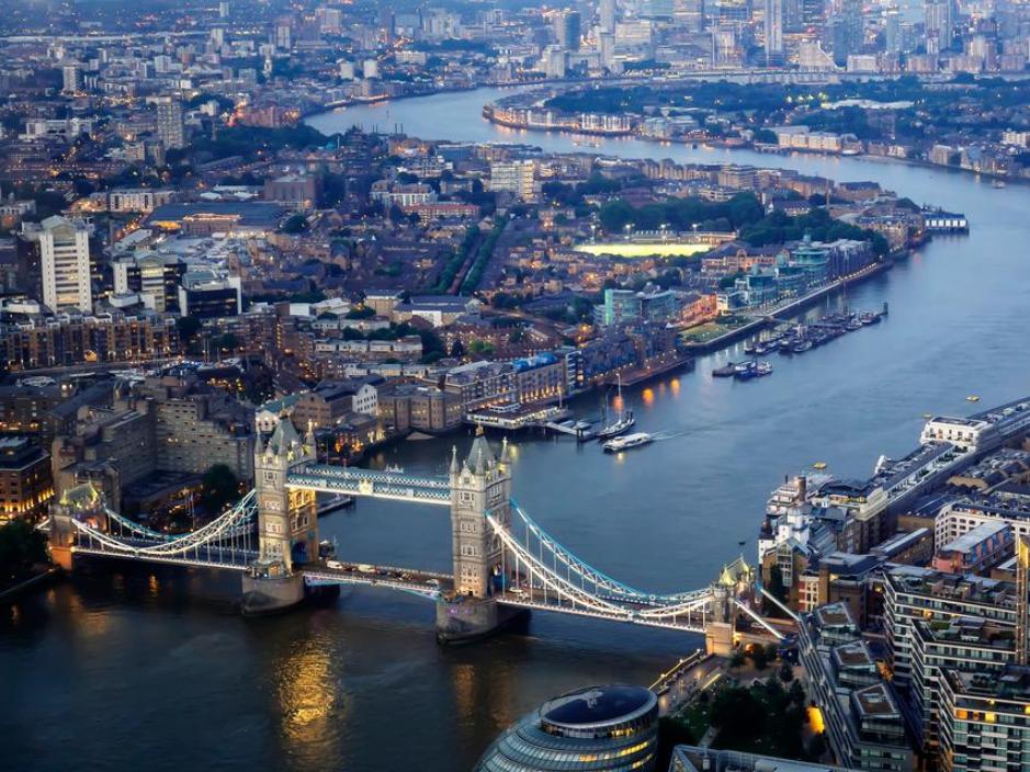 Aerial photo of the River Thames including Tower Bridge and Canary Wharf