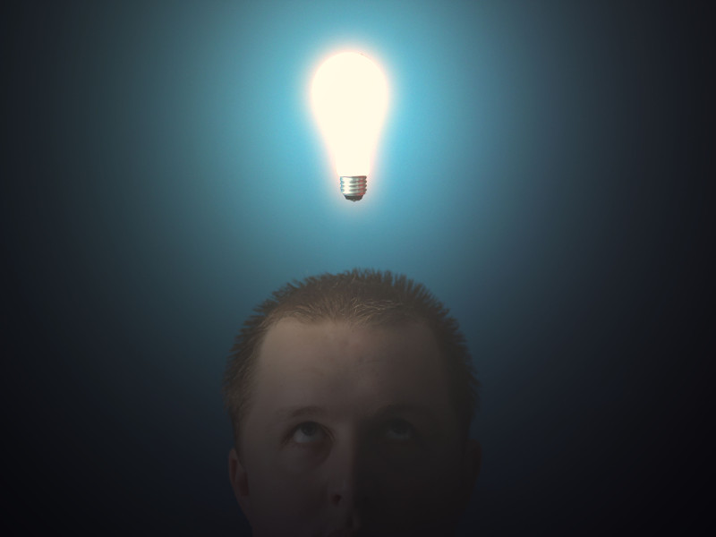 Person having a light bulb inspired moment